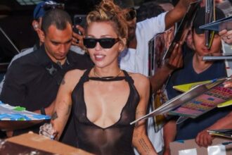 Miley Cyrus Wore a Black Ludovic de Saint Sernin Carrie Dress to Celebrate Something Beautiful Feat