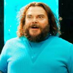 a minecraft movie jack black steve entering the overworld