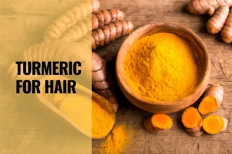 bowl of turmeric powder for hair growth.webp