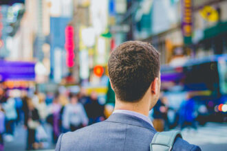 A Man Walking on the Street Careers Path Careers In Government