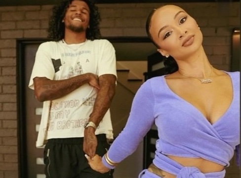 Draya Answers Gen Z Questions with Jalen Green in Maisie Wilen Purple Terry Cloth Wrap Cardigan and