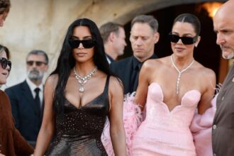 Kim Kardashian in Vintage Versace Khloe in Pink Tamara Ralph Couture and Kylie Jenner in Dilara Find