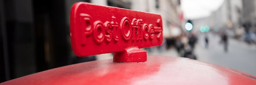Post Office sign on post box Sinan adobe
