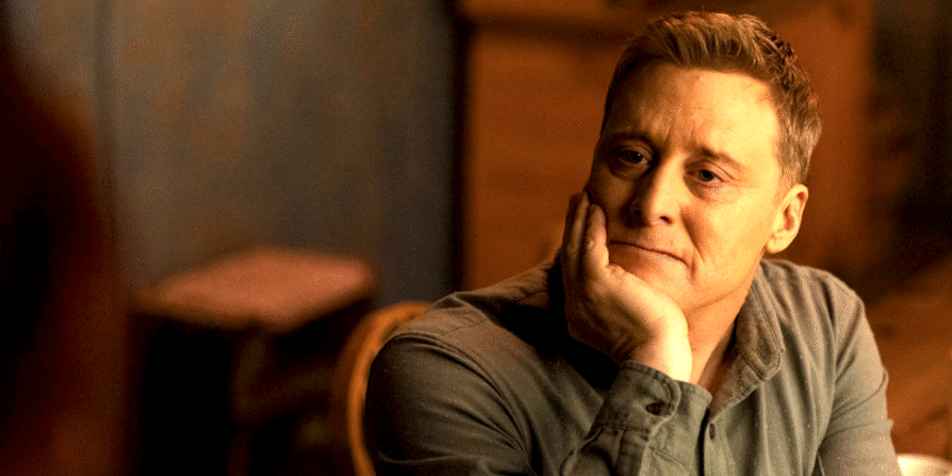 alan tudyk with his chin in his hand in resident alien