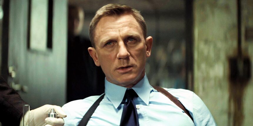 daniel craig as james bond looking annoyed while sitting in spectre