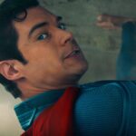 david corenswet s superman struggling to hold up a building in dcu superman movie