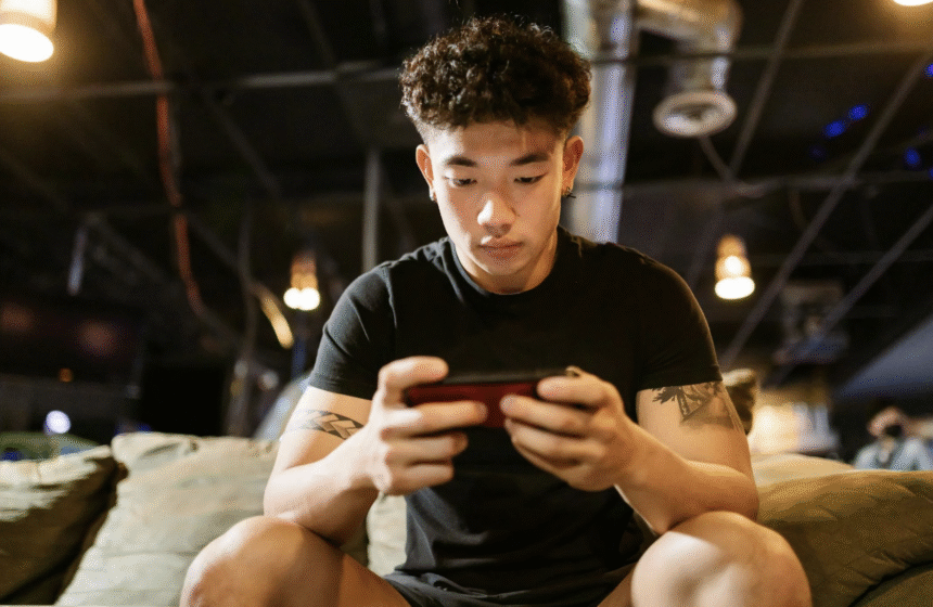 guy playing with a smartphone