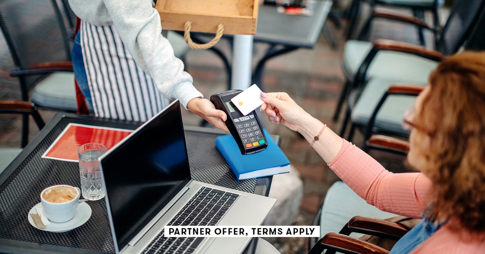 20250715 SOCIAL DISCLAIMER PARTER OFFER TERMS APPLY waitress holding credt card reader for customer