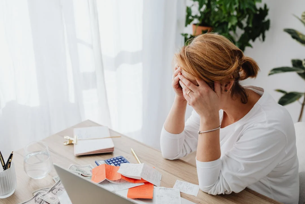 woman desperate with debts