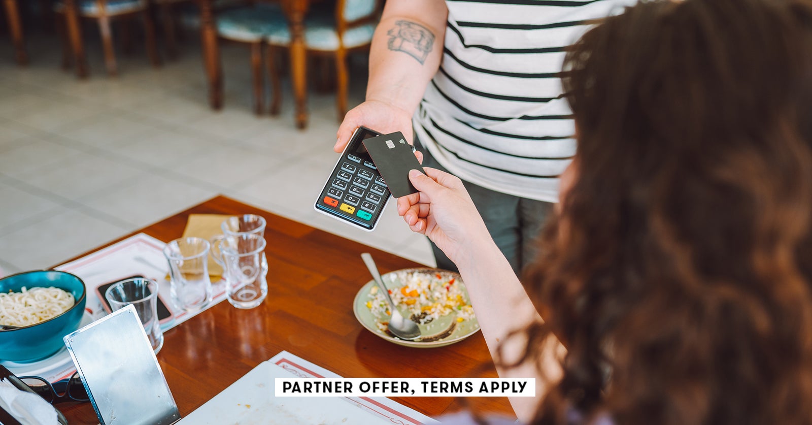 20250715 SOCIAL DISCLAIMER PARTER OFFER TERMS APPLY Customer paying by card at restaurant Olga Rolen
