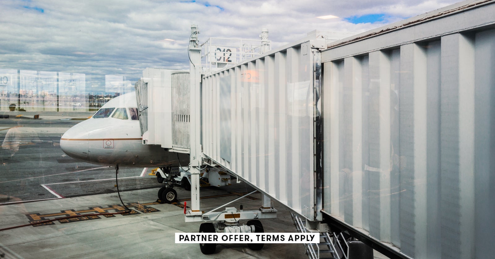 SOCIAL IMAGE PARTNER OFFER TERMS APPLY Walkway to airplane on runway Eric Raptosh Photography 4