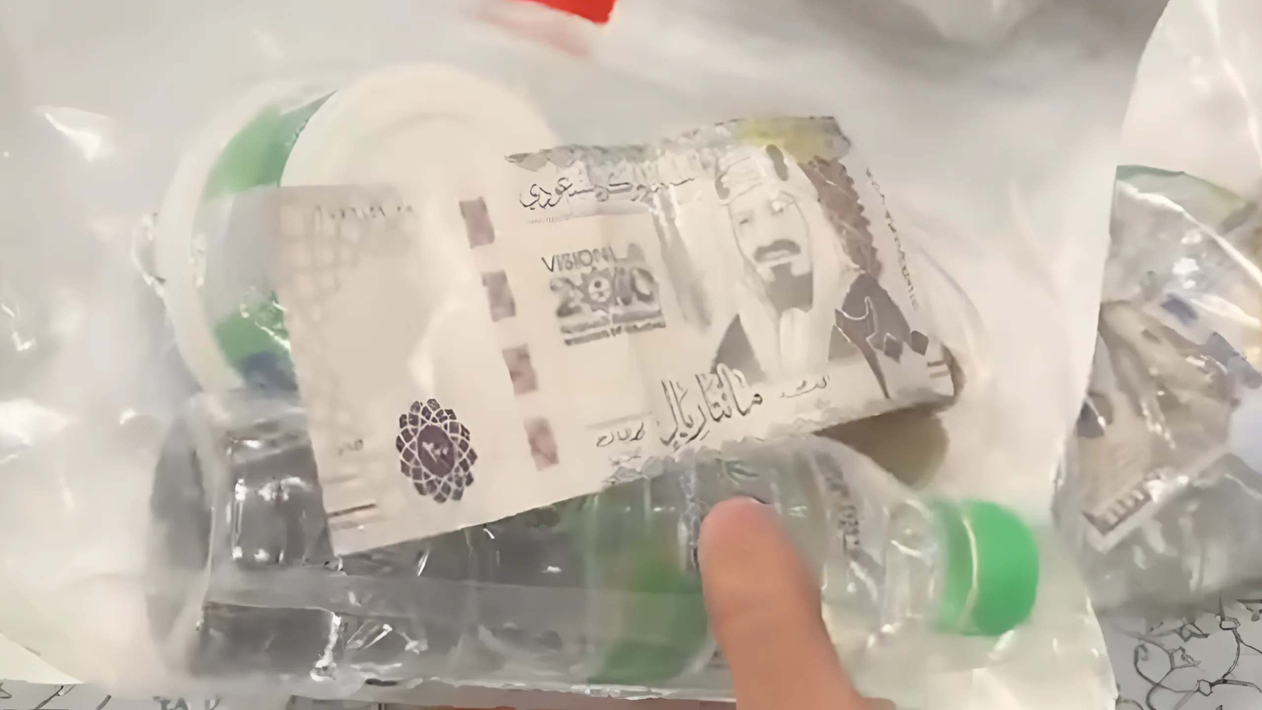 riyals in iftar package png.webp