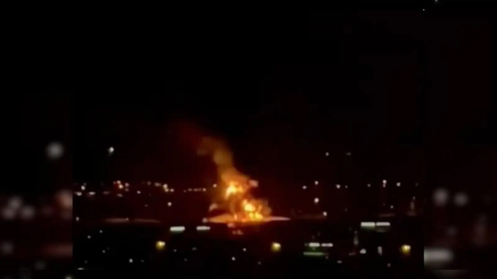 Fire erupts near a fuel tank facility close to Dubai International Airport following a reported dron