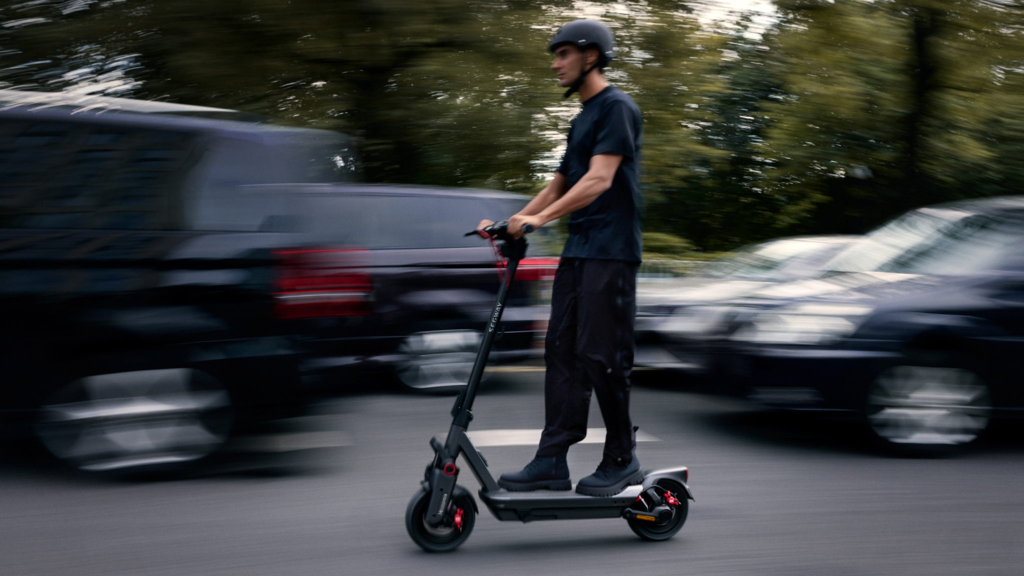 Person riding Segway Max G3 Electric Scooter