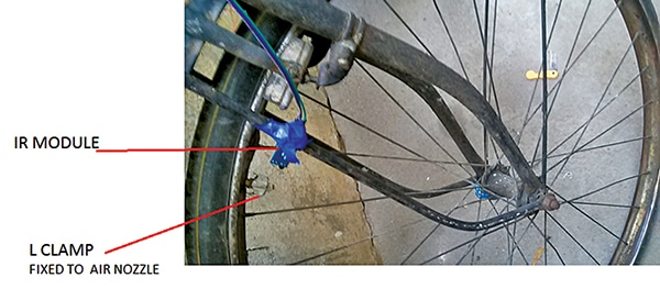 Authors prototype showing attachment of the IR module to a bicycle wheel for speed measurement
