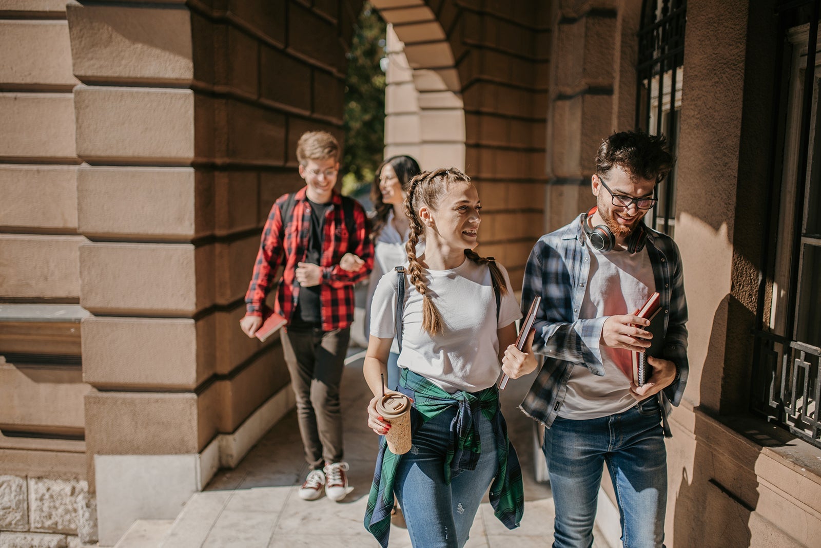 Group of students walking in university