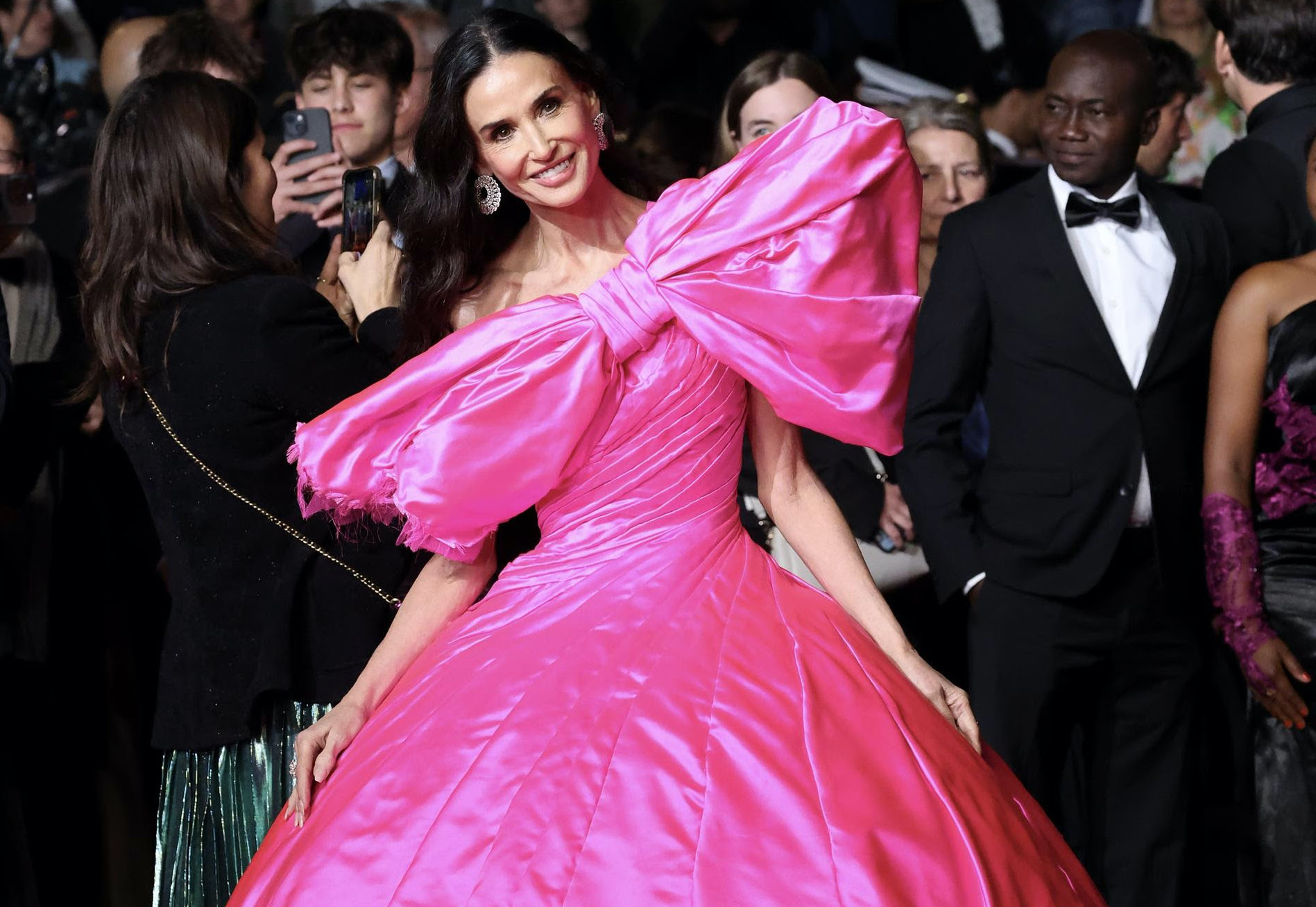 Demi Moore in Pink Silk Matieres Fecales at the Paper Tiger Premiere During the 79th Cannes Film Fes