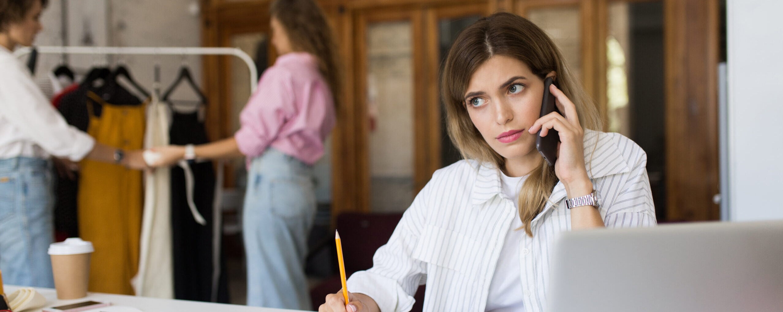 young lady white striped shirt with pencil notepad though scaled e1778078676544